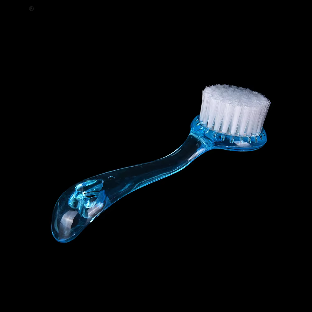 Brosse nettoyante et exfoliante en plastique pour le lavage du visage