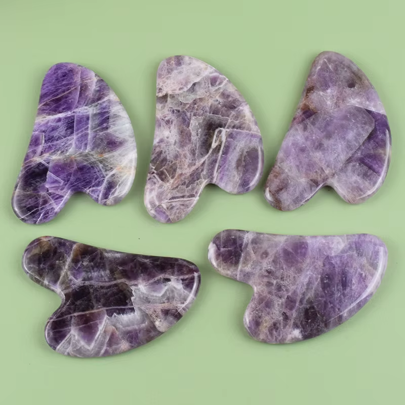 Outil Gua Sha en améthyste pour le visage