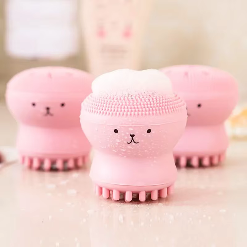 Brosse faciale poulpe rose avec éponge