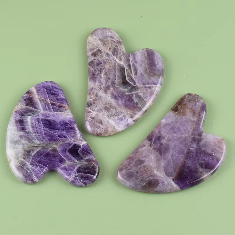 Outil Gua Sha en améthyste pour le visage