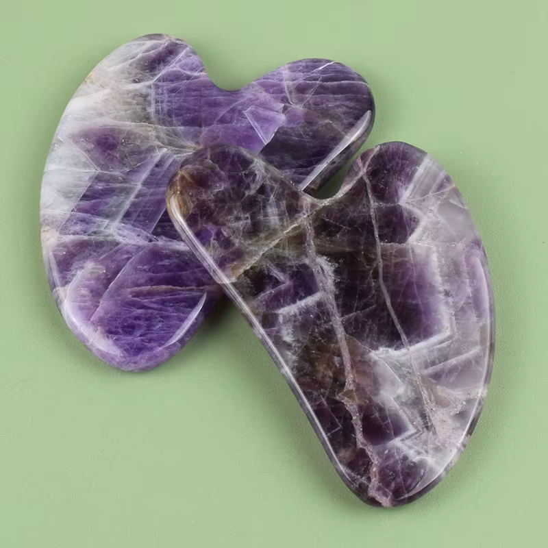 Outil Gua Sha en améthyste pour le visage