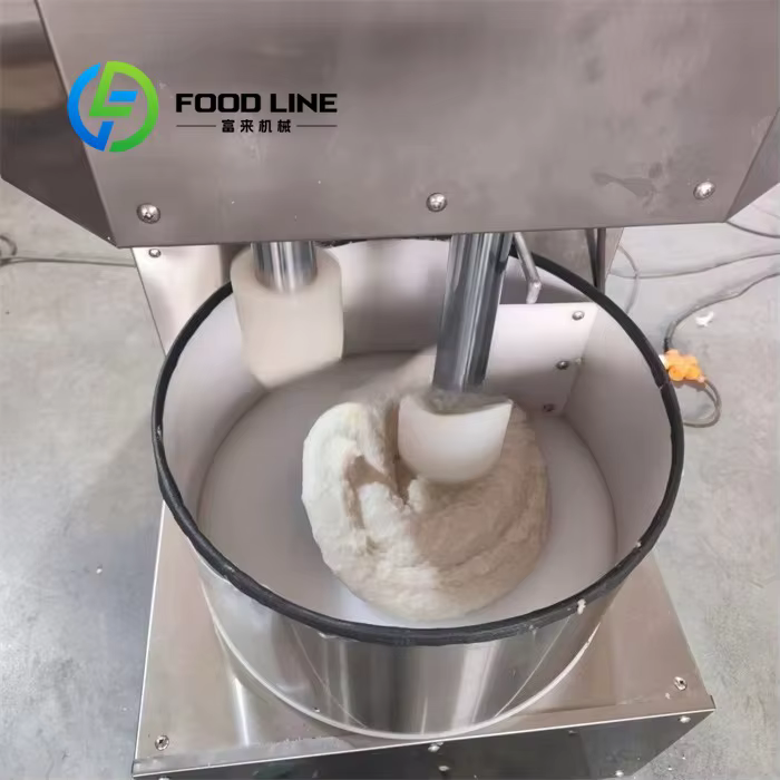 Machine professionnelle pour gâteaux de riz traditionnels, conçue pour restaurer la saveur authentique des spécialités locales à base de riz gluant.