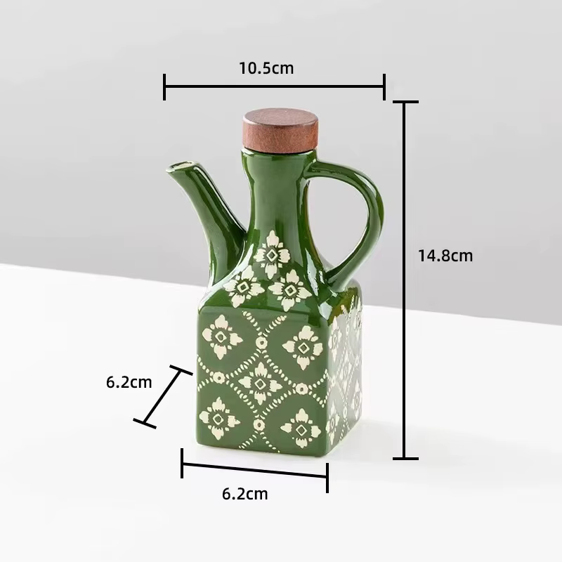 Ensemble de galettes en céramique avec bec verseur, bouteilles d'huile de cuisine et de verre en vinyle, design floral moderne, pots de rangement décoratifs sur comptoir